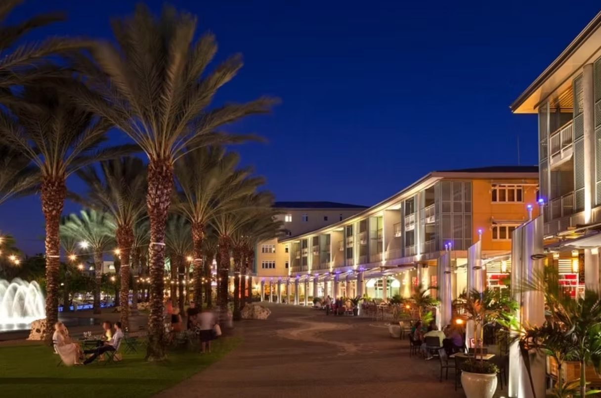 Camana Bay mixed-use waterfront development at night, Grand Cayman