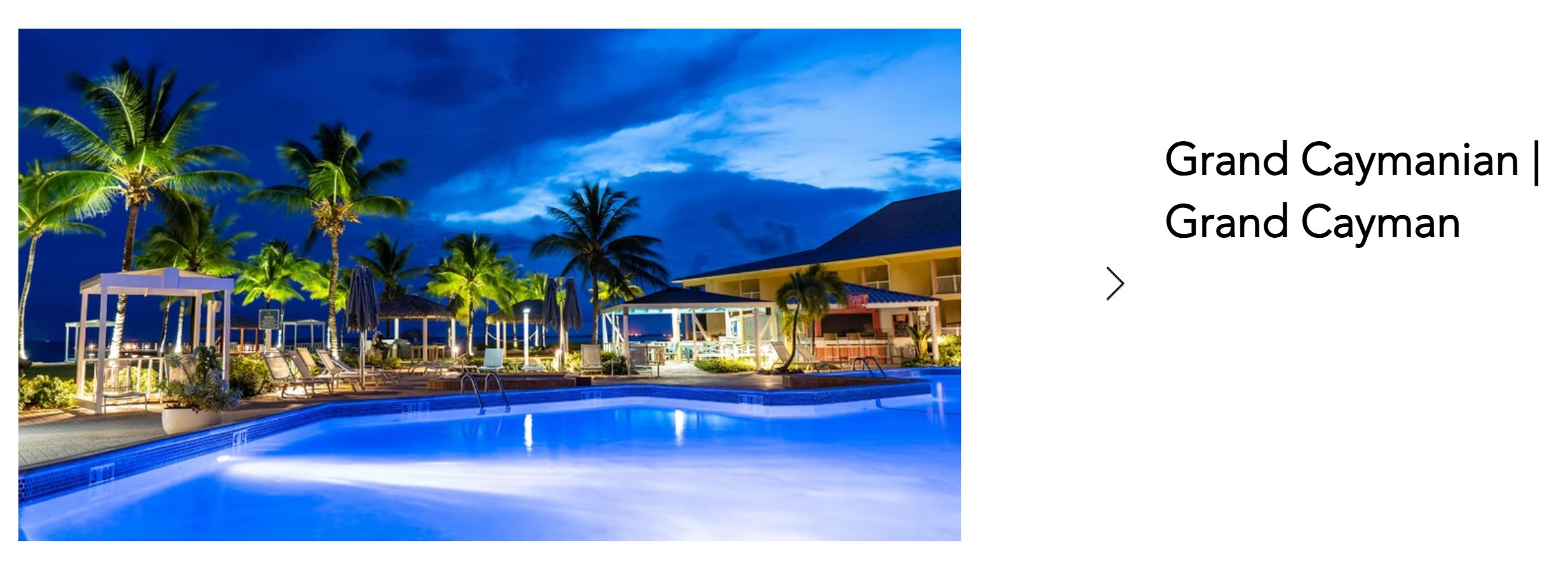 Grand Caymanian Resort pool illuminated at night, Grand Cayman
