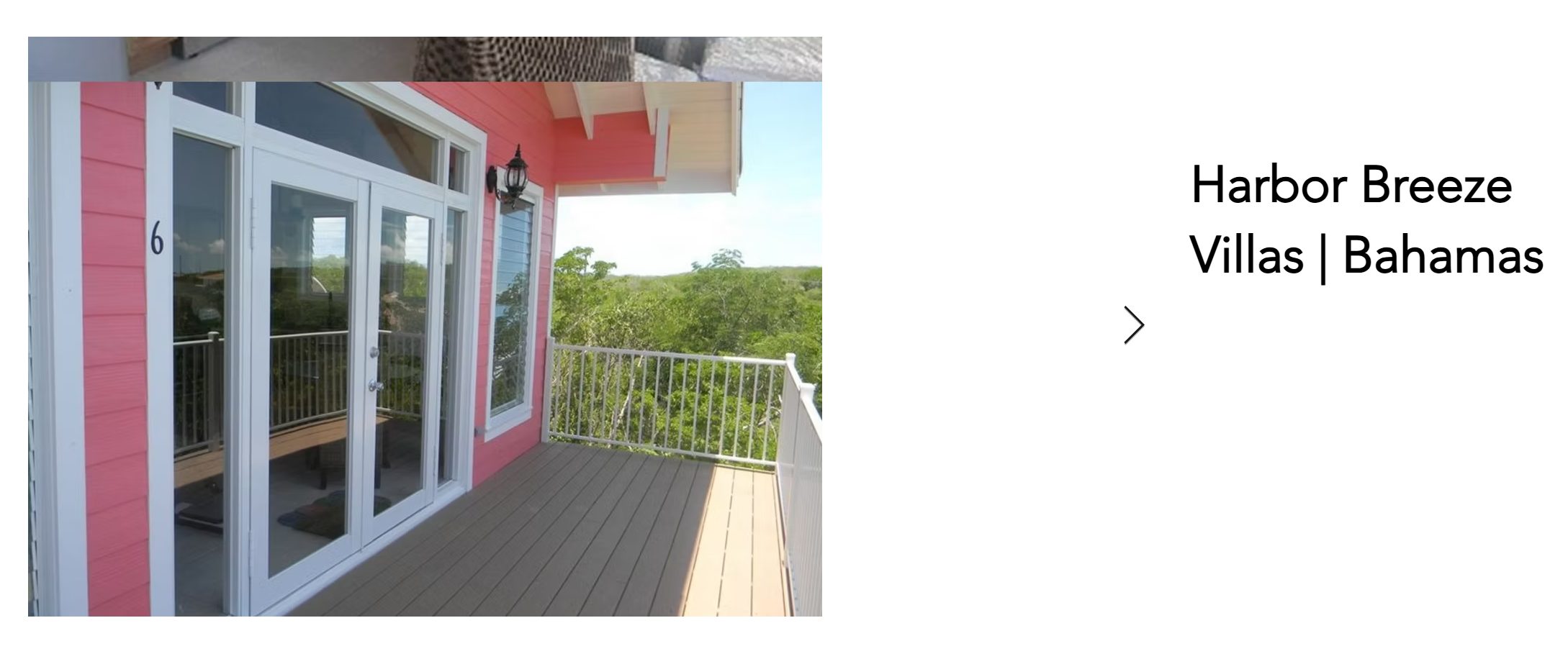 Harbor Breeze Villas deck with impact-rated glass doors and windows, Bahamas