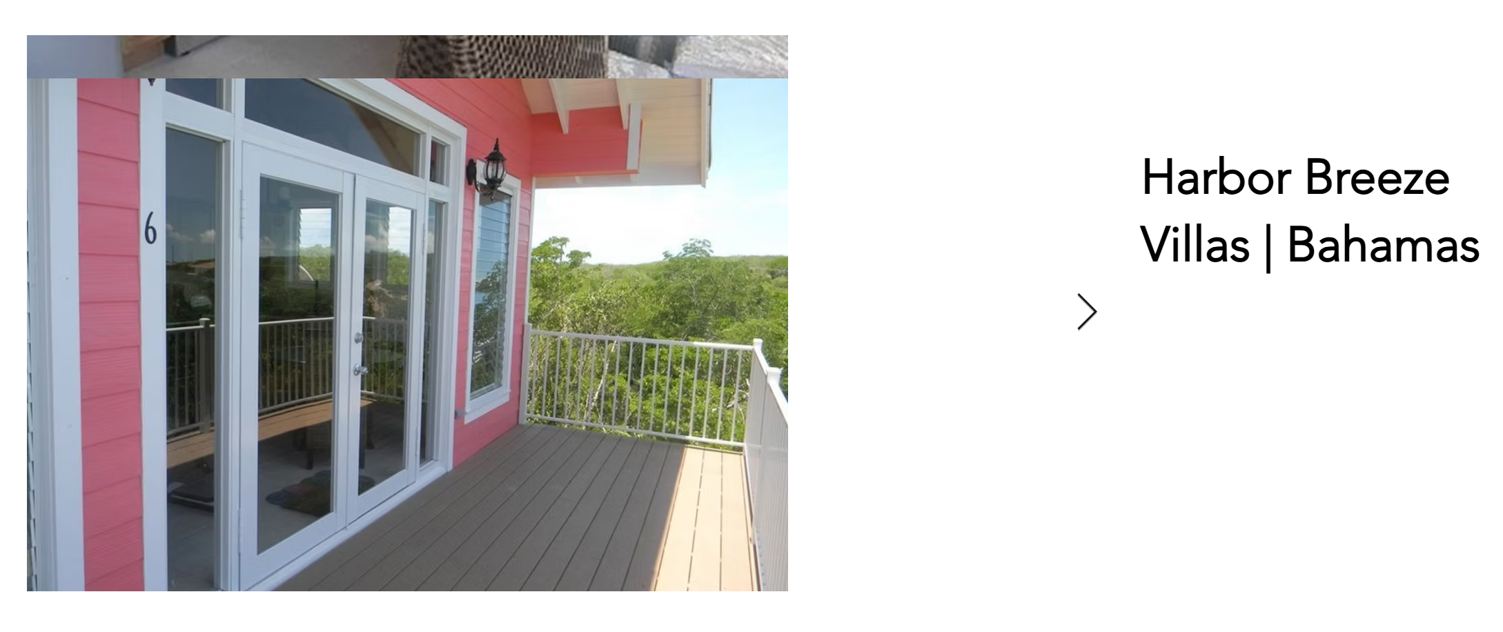 Harbor Breeze Villas deck with impact-rated glass doors and windows, Bahamas